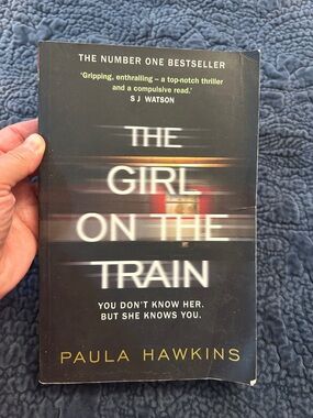 The Girl on the Train by Paula Hawkins - Black with Gold Title